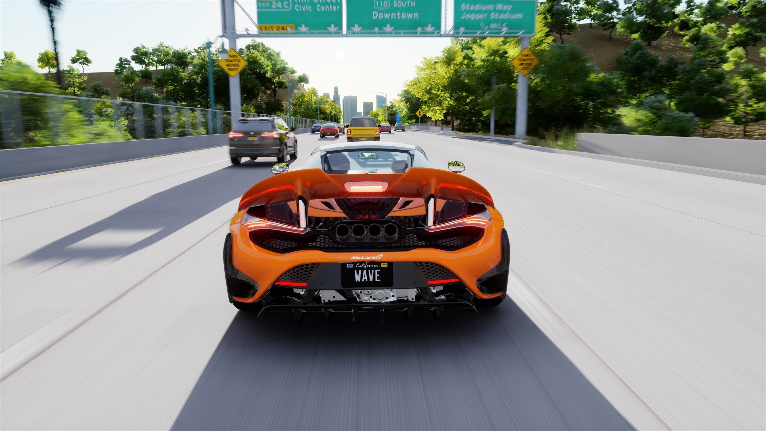 Orange McLaren driving through the city